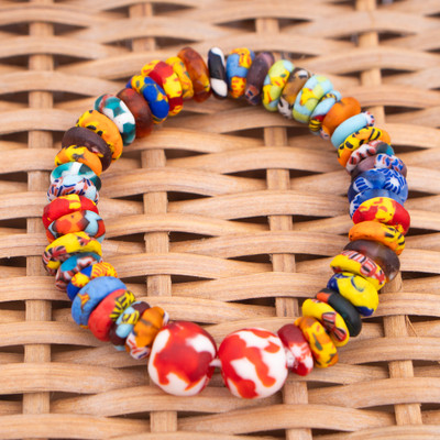 Recycled glass beaded stretch pendant bracelet, 'Carnival of Color' - Sustainable Recycled Glass Beaded Stretch Pendant Bracelet