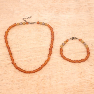 Recycled glass beaded jewelry set, 'Sunrise Thoughts' - Sunrise Orange Glass Beaded Necklace Bracelet Jewelry Set