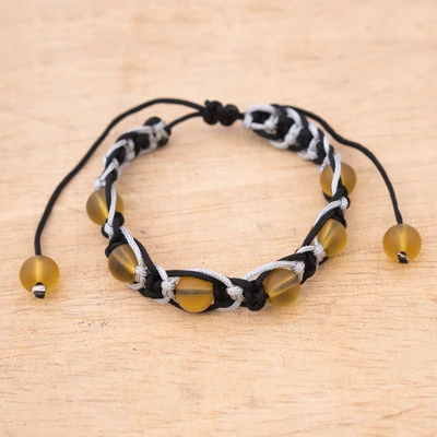 Glass beaded macrame bracelet, 'Glowing Spirit' - Black and White Macrame Bracelet with Amber Glass Beads