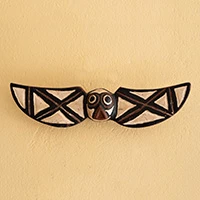 African wood wall mask, 'Hypnotizing Owl' - Owl-Winged African Wood Wall Mask Carved Painted by Hand