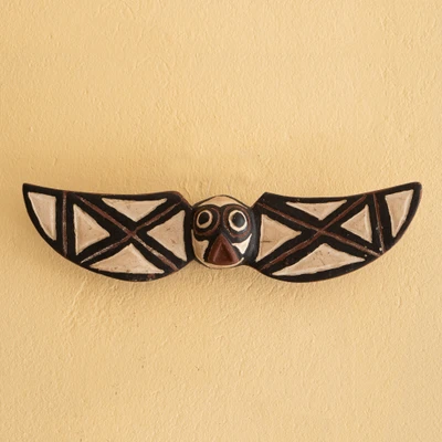 African wood wall mask, 'Hypnotizing Owl' - Owl-Winged African Wood Wall Mask Carved Painted by Hand