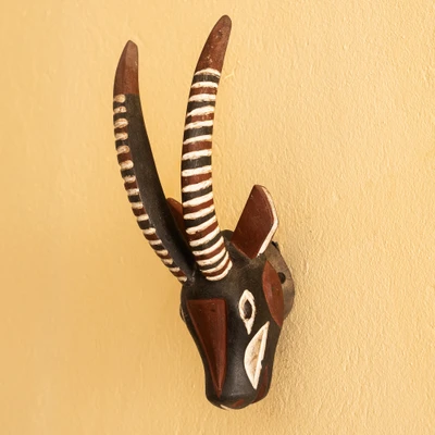 Wood African wall mask, 'Gazelle Past' - Handcrafted Black & Brown Wood Gazella African Wall Mask