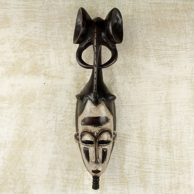 Ivoirian wood mask, Brave and Strong