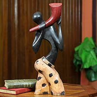 Wood sculpture, 'Royal Horn Blower'