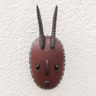 Maske aus ivorischem Holz - Handgefertigte Maske aus ivorischem Holz