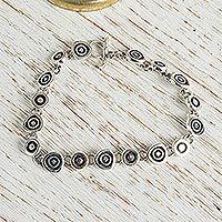 Sterling silver charm bracelet,