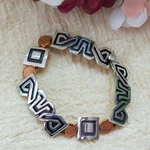 Sterling silver link bracelet, 'Solar Frieze' - Sterling silver link bracelet