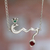 Garnet pendant necklace, 'Scorpio Bird' - Garnet Handmade Sterling Silver Pendant Necklace Mexico thumbail