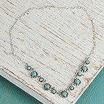 Handmade Floral Sterling Silver Natural Turquoise Necklace, 'Aztec Star'