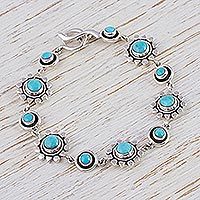 Turquoise flower bracelet, 'Aztec Star' - Artisan Crafted Silver and Natural Turquoise Bracelet