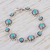 Turquoise flower bracelet, 'Aztec Star' - Artisan Crafted Silver and Natural Turquoise Bracelet thumbail