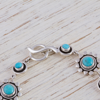 Turquoise flower bracelet, 'Aztec Star' - Artisan Crafted Silver and Natural Turquoise Bracelet