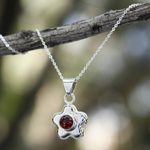 Garnet flower necklace, 'Aztec Daisy' - Garnet flower necklace