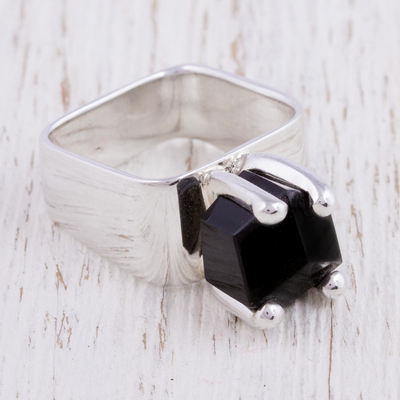 Ring with clearance obsidian facets