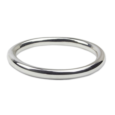 Sterling silver bangle bracelet, 'Oval Halo' - Contemporary Oval Bangle Bracelet in Polished Taxco Silver