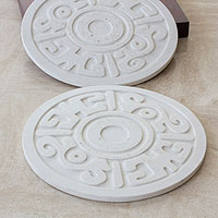 Resin hot pads, 'Ancient Flower' (Pair) - Trivets Handcrafted of Resin with Pre-Hispanic Embossed Desi