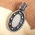 Sterling silver pendant, 'Opposites' - Taxco Sterling Silver Oval Pendant thumbail