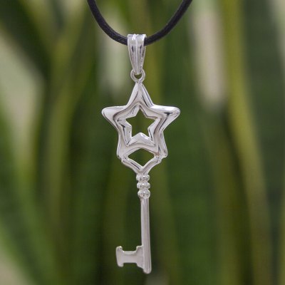 Sterling silver pendant necklace, 'Key to the Stars' - Silver Key Pendant Black Leather Necklace from Mexico