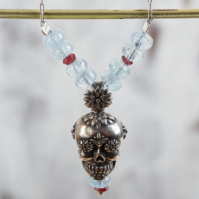 Garnet and quartz flower necklace, 'Cempazuchitl Skull' - Day of the Dead Silver Necklace with Garnet and Aquamarine