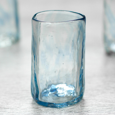 Blown glass shot glasses, 'Azure Mist' (set of 4) - Set of 4 Mexican Clear Blue Blown Glass Mezcal Shot Glasses