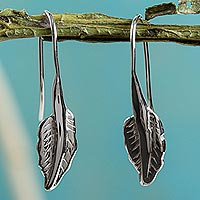 Sterling silver drop earrings, 'Windblown Leaf' - Artisan Crafted Mexican Silver Leaf Theme Earrings