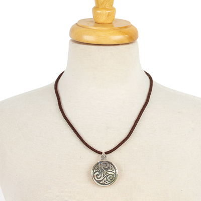 Sterling silver and leather pendant necklace, 'Celtic Triskelion' - Fair Trade Celtic Handcrafted Brown Leather Silver Necklace