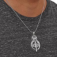 Sterling silver pendant necklace, 'Shining Flame' - Sterling Silver Silhouette Handcrafted Pendant Necklace