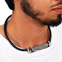 Sterling silver and leather pendant necklace, 'Celtic Frieze' - Leather and Sterling Silver Pendant Necklace from Mexico