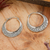 Sterling silver hoop earrings, 'Rustic Elegance' - Hand Crafted Sterling Silver Hammered Hoop Earrings thumbail