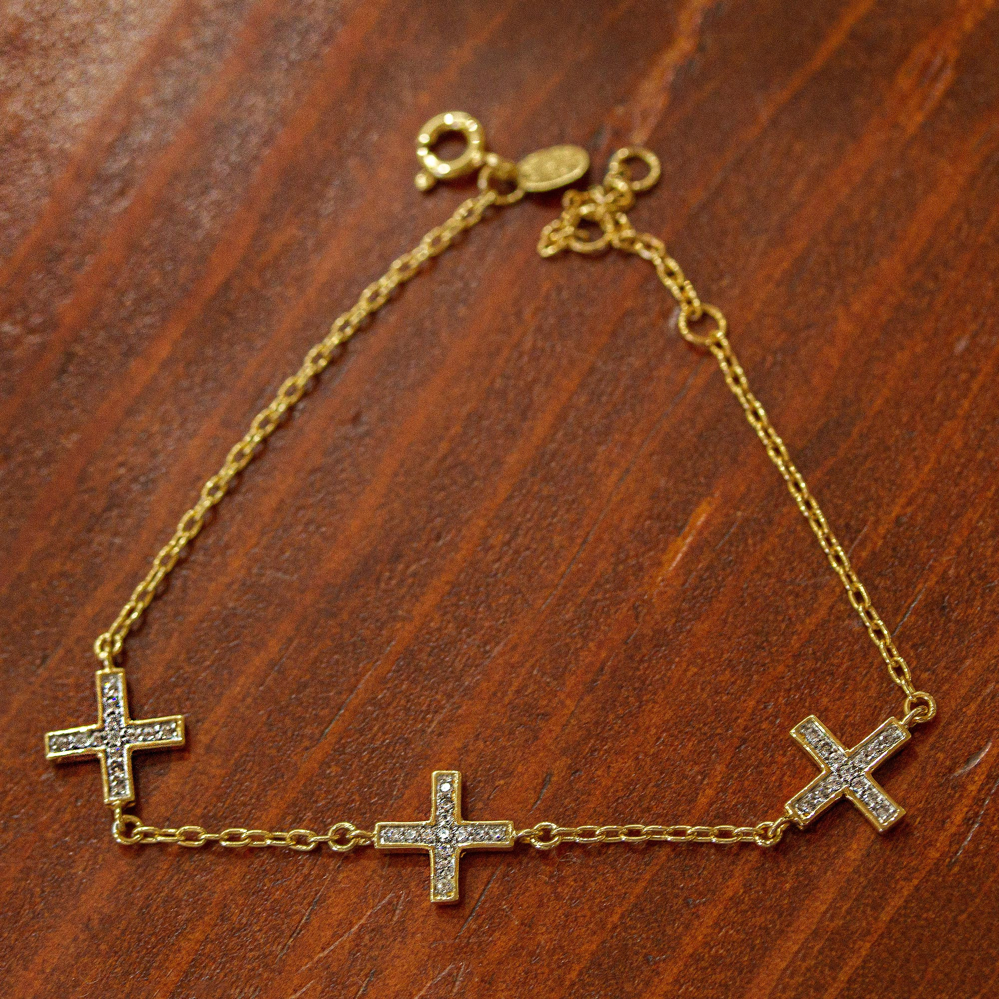 Sideways cross sale bracelet gold