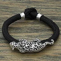 Sterling silver and leather braided bracelet, 'Life of the Jaguar'