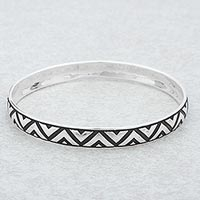Sterling silver bangle bracelet, 'Mexican Geometry' - Sterling Silver Triangle Motif Bangle Bracelet from Mexico