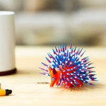 Copal wood alebrije, 'Cute Porcupine in Red' - Copal Wood Alebrije Porcupine Sculpture in Red and Blue