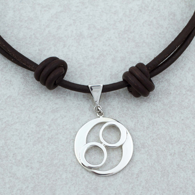 Sterling silver pendant necklace, 'Omelotl' - Taxco Sterling Silver and Leather Pendant Necklace
