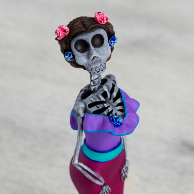 Ceramic sculpture, 'Floral Catrina' - Hand Painted Catrina Sculpture in Strawberry and Boysenberry
