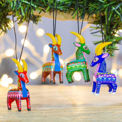 Wood alebrije ornaments, 'Colorful Goats' (set of 4) - Four Hand-Painted Goat Alebrije Ornaments from Mexico