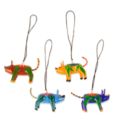 Wood ornaments, 'Colorful Alebrije Pigs' (set of 4) - Four Hand-Painted Pig Alebrije Ornaments from Mexico