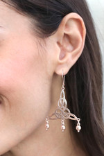 Sterling silver chandelier earrings, 'Wonderful Knots' - Sterling Silver Knot Motif Chandelier Earrings from Mexico