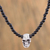 Sterling silver pendant necklace, 'Skull Between the Stones' - Sterling Silver and Lava Stone Skull Necklace from Mexico