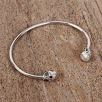 Sterling silver cuff bracelet, 'Skulls of Tradition' - Sterling Silver Cuff Bracelet with Skulls from Mexico