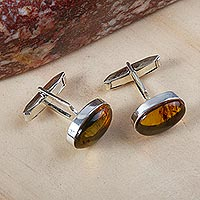 Amber cufflinks, 'Amber Harmony' - Men's Sterling Silver and Amber Oval Cufflinks from Mexico