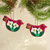 Ceramic ornament, 'Bright Bird Joy' (pair) - Handcrafted Fuchsia Ceramic Peace Dove Ornaments (Pair)