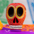 Wood figurine, 'Death and Folklore' - Mexican Hand Painted Terracotta Hue Wooden Skull Figurine (image 2) thumbail