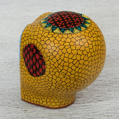 Wood figurine, 'Ancestral Image' - Hand Carved Wood Skull Figurine in Yellow from Mexico