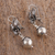 Sterling silver dangle earrings, 'Light and Peace' - Sterling Silver Flower Dangle Earrings from Mexico