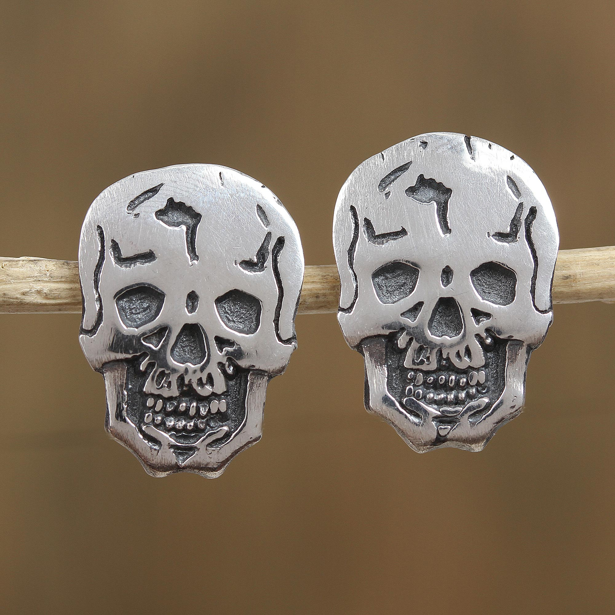 silver skull earrings