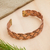 Copper cuff bracelet, 'Brilliant Weave' - Handcrafted Braided Copper Cuff Bracelet from Mexico thumbail