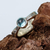 Blue topaz solitaire ring, 'Xolotl Gleam' - Taxco Silver Blue Topaz Solitaire Ring from Mexico