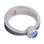 Blue topaz solitaire ring, 'Xolotl Gleam' - Taxco Silver Blue Topaz Solitaire Ring from Mexico