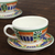 Ceramic teacups and saucers, 'Special Treat' (pair) - Hand-Painted Ceramic Teacups and Saucers from Mexico (Pair) thumbail